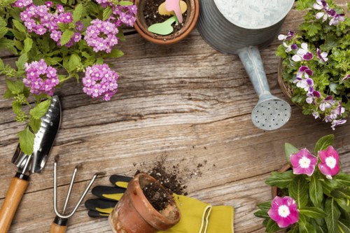 Gardening team preparing equipment on a garden site